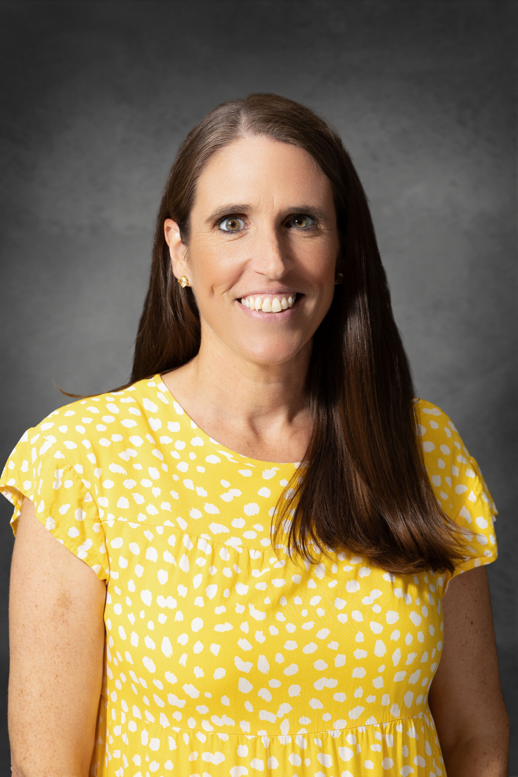a man wearing a hat and glasses