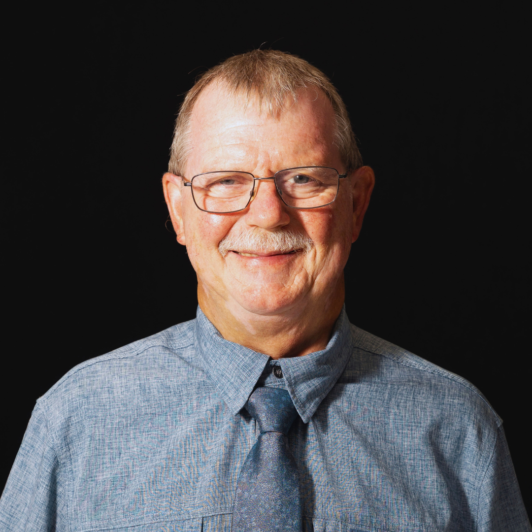 15 a man wearing a hat and glasses